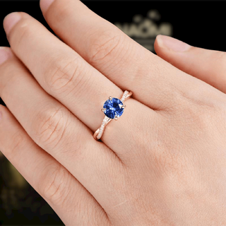 Round Cut 1.25 ct Blue Sapphire Twist Promise Ring
